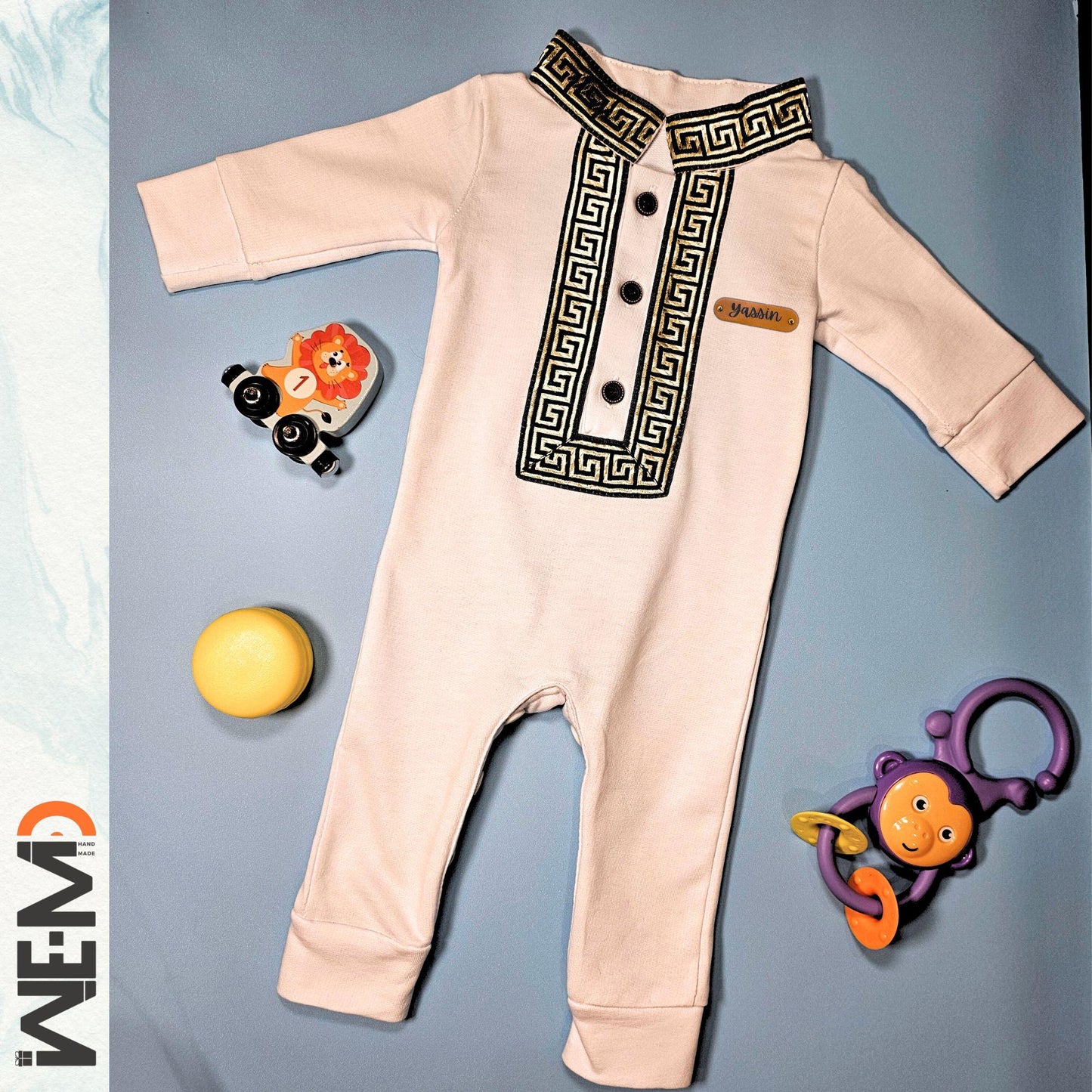 Full white Islamic baby outfit with toys, ideal for Eid and Ramadan gifts
