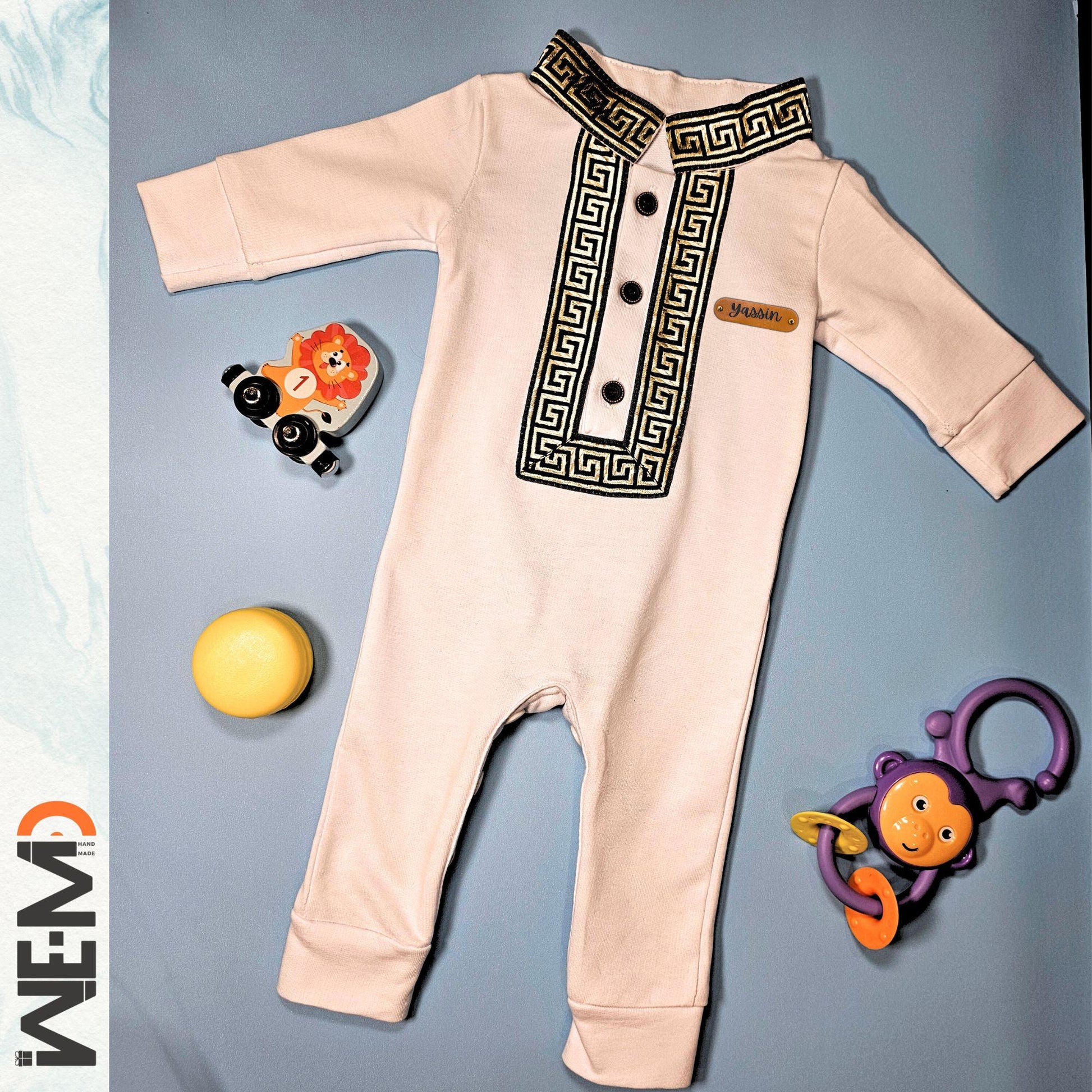 Full white Islamic baby outfit with toys, ideal for Eid and Ramadan gifts