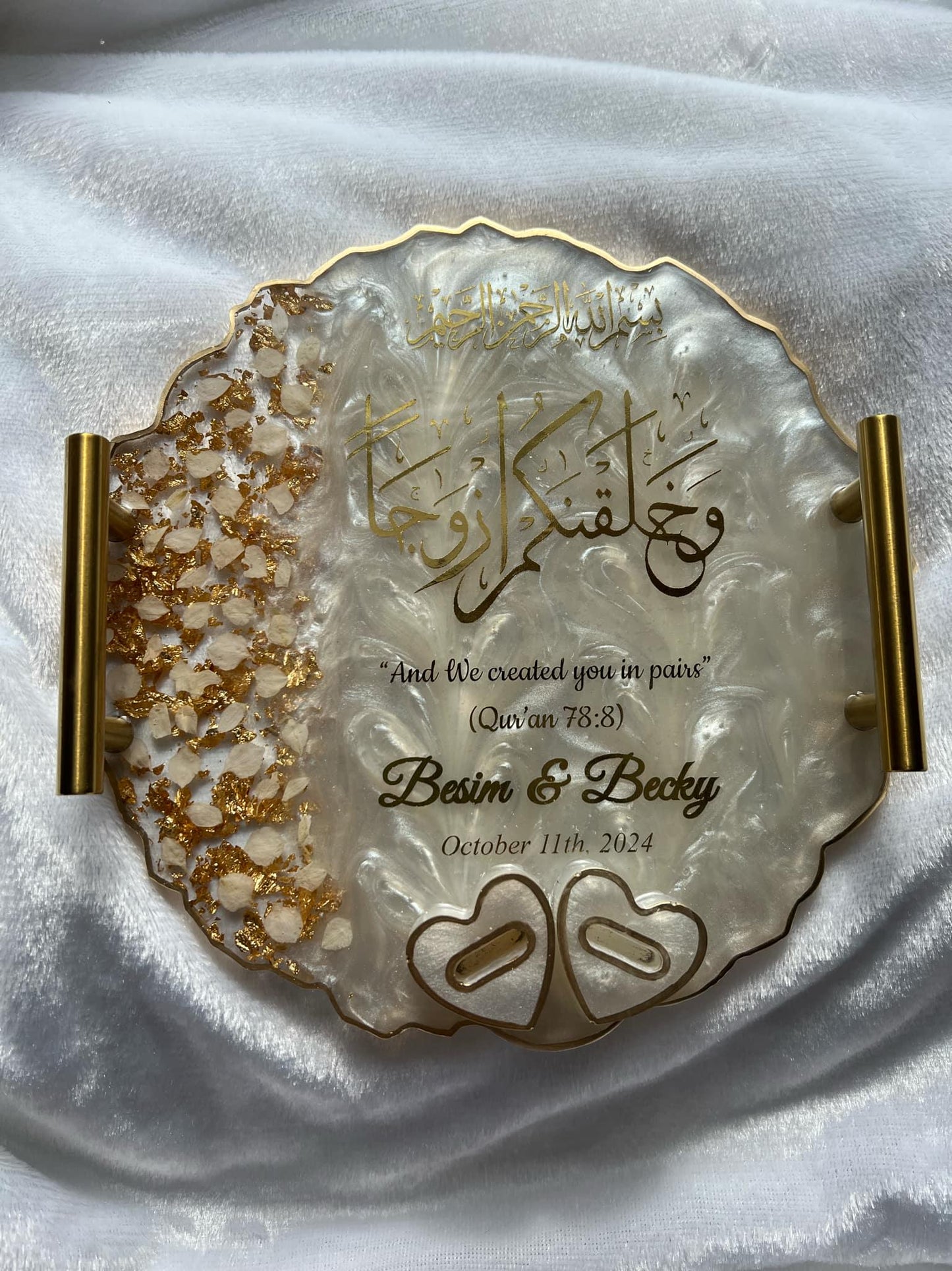 Round resin tray for Nikkah ceremony, featuring 'And We Created You in Pairs' verse, gold handles, and pressed flower design