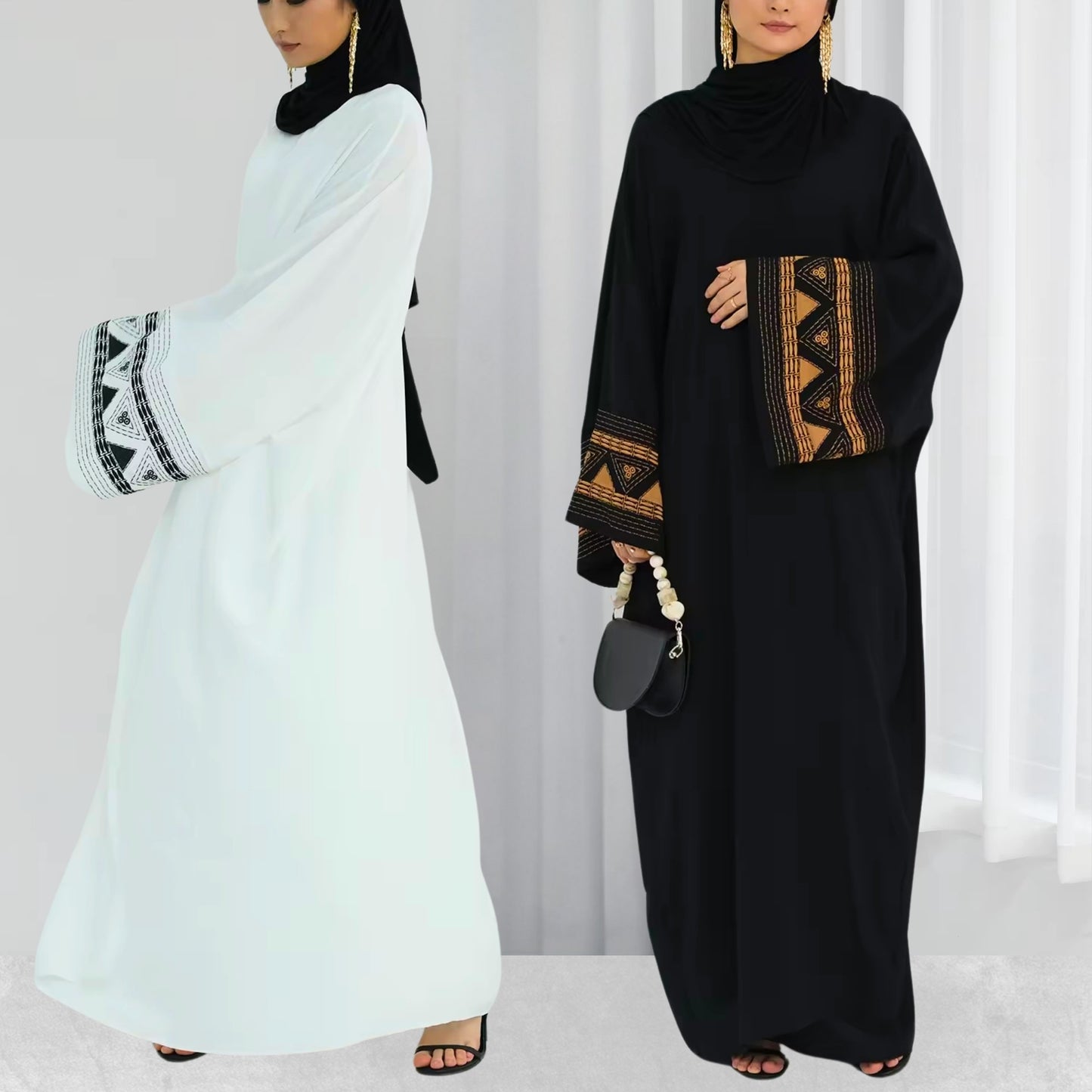 Model wearing black and white abaya – modest outfit for hijabi women